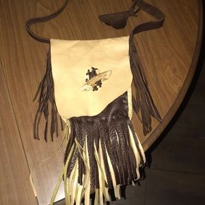 Tan and Brown Cowhide Crossbody With Antler